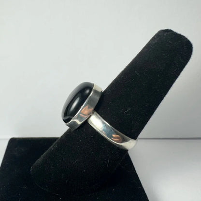 Sleek sterling silver black onyx ring with oval stone