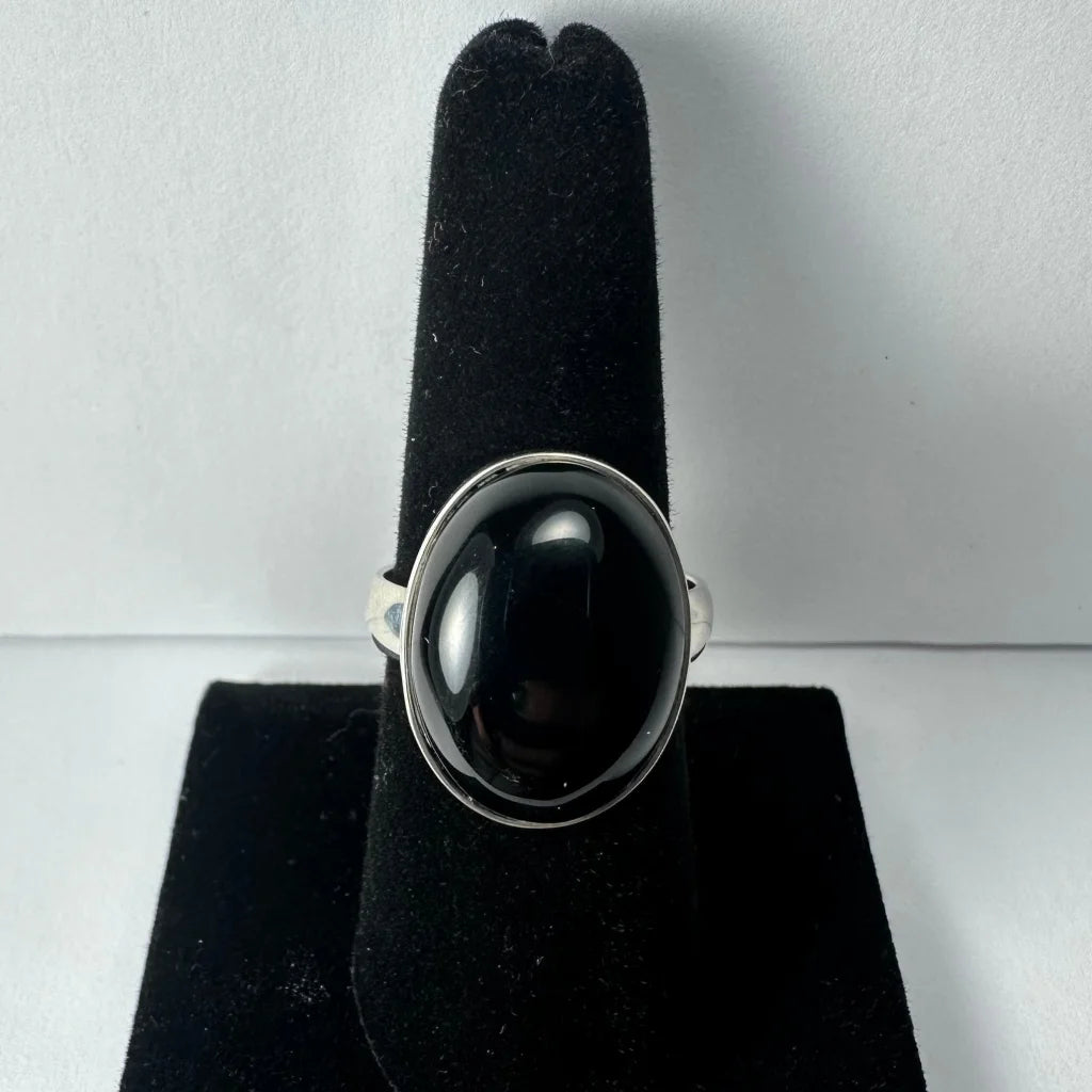 Sleek sterling silver black onyx ring with large oval stone