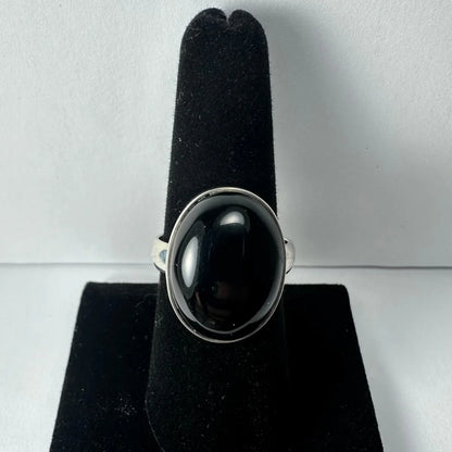 Sleek sterling silver black onyx ring with large oval stone