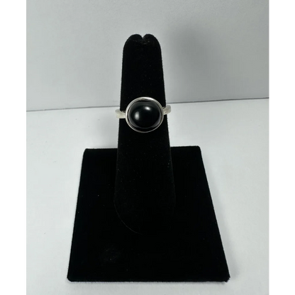 Stunning black onyx ring with smooth round stone in sterling silver bezel