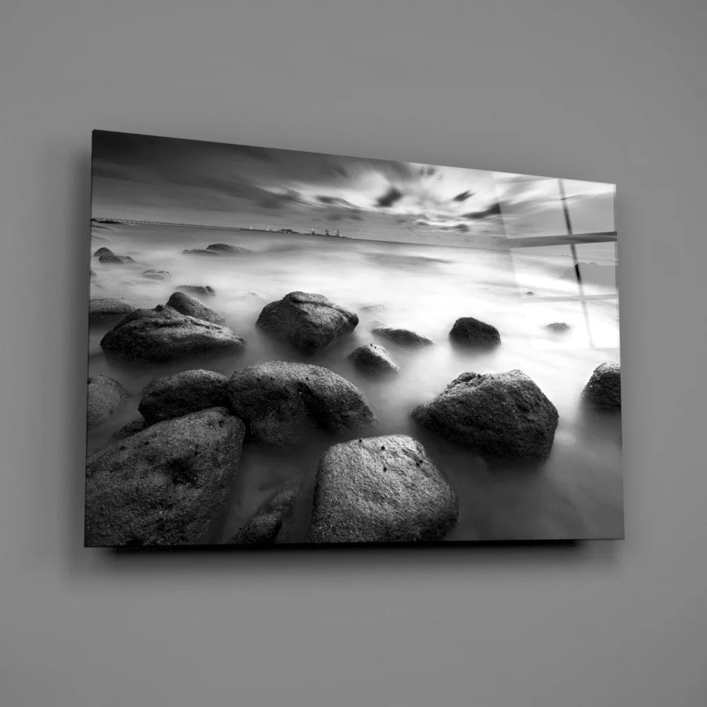 Black and white beach stones canvas wall art with foreground rocks