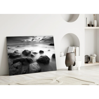 Black and white beach stones canvas wall art with ocean waves