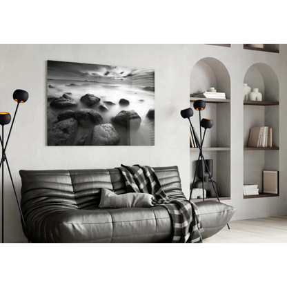 Stunning black leather sofa with textured pattern and plaid throw