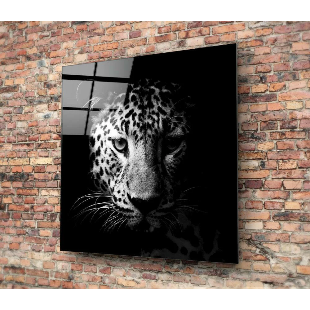 Stunning black and white jaguar glass wall art on brick wall