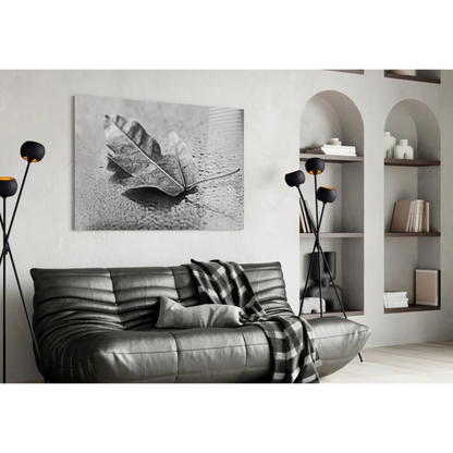 Black white maple leaf canvas wall art print on textured wall