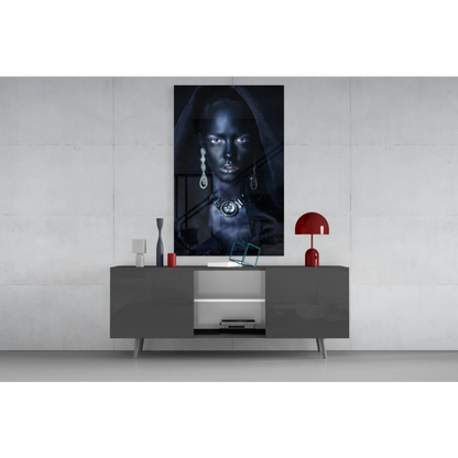 Black and white portrait woman with large earrings on glass wall art