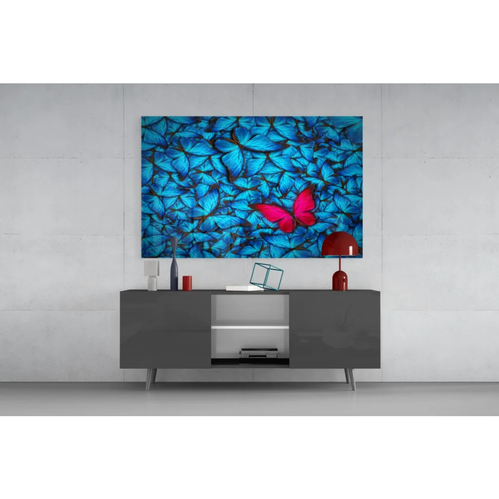 Vibrant blue butterfly glass wall art with pink accent pop