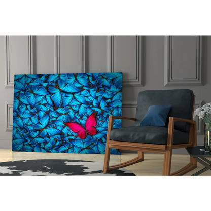 Stunning blue butterfly glass wall art with pink accents