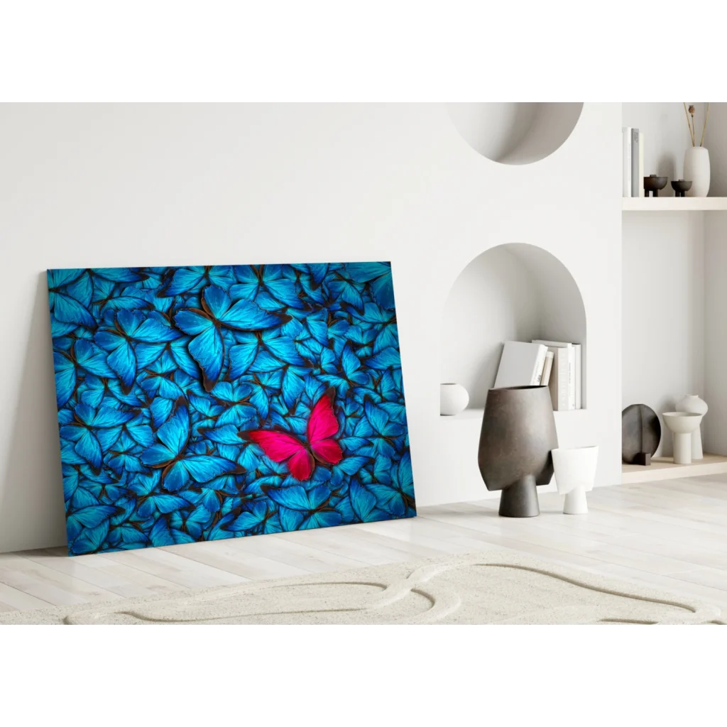 Stunning blue butterfly glass wall art with pink accent pop