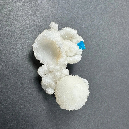 Stunning blue Cavansite balls on white Stilbite crystals from India