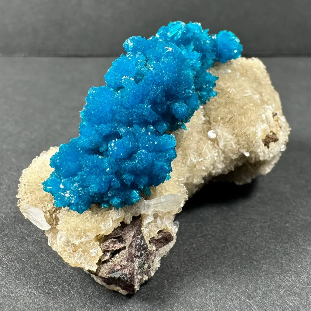 Stunning blue cavansite crystal cluster from India on rock matrix