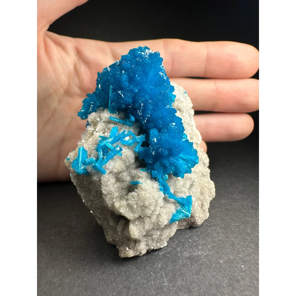Vibrant blue Cavansite crystal cluster on gray rock from India