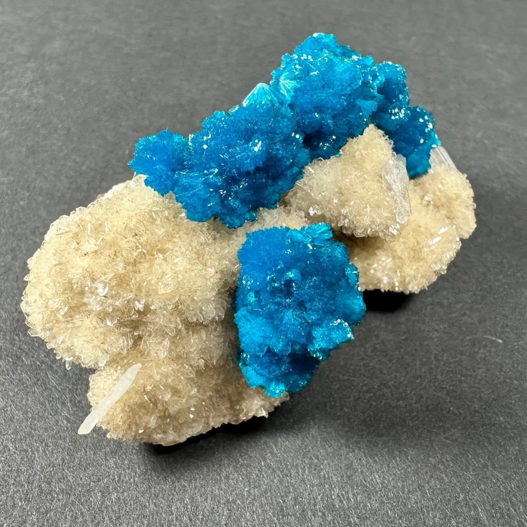 Vibrant blue cavansite crystal cluster from India on quartz matrix