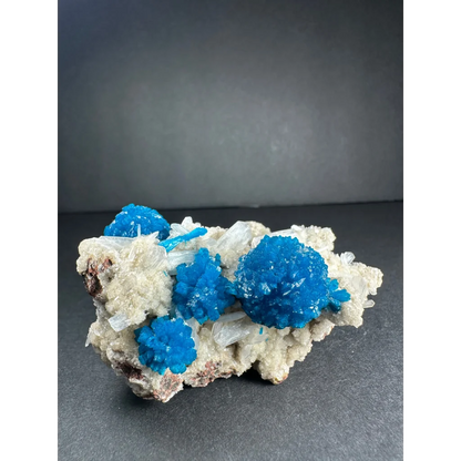 Stunning blue cavansite crystal cluster from India on rocky matrix