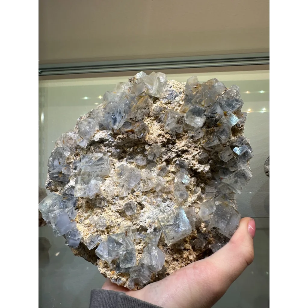 Stunning blue fluorite crystal cluster from China on beige matrix