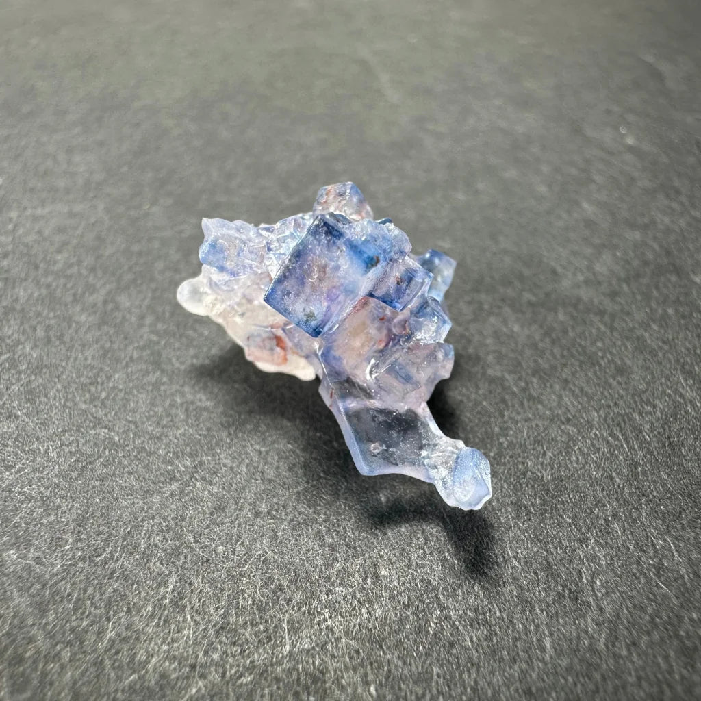 Stunning blue fluorite cube cluster from Minerva Mine with translucent purple facets