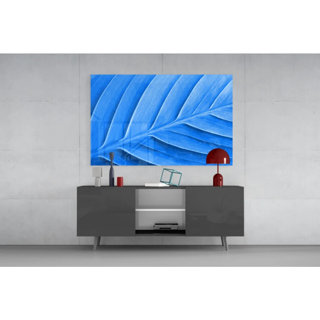 Modern gray sideboard under stunning blue leaf wall art