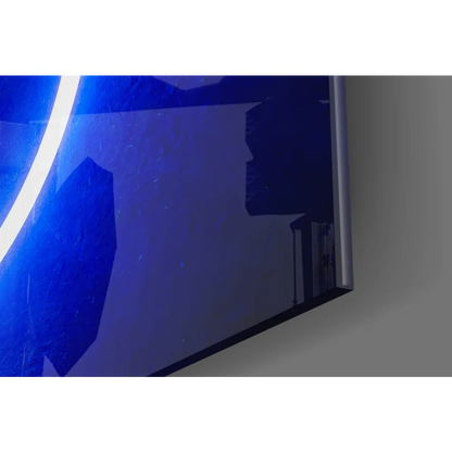 Stunning blue neon circle glass wall art with Samsung QLED TV glow