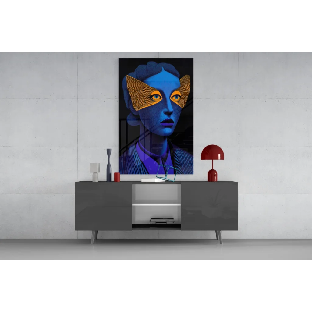 Stunning blue and gold abstract glass wall art portrait above gray console