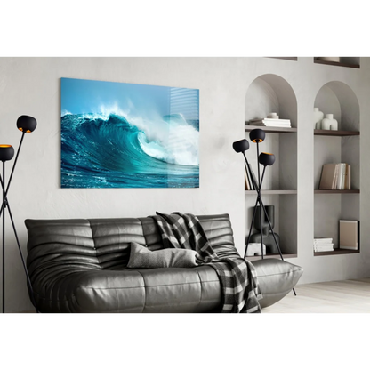 Modern black leather sofa with checkered throw under blue wave wall art