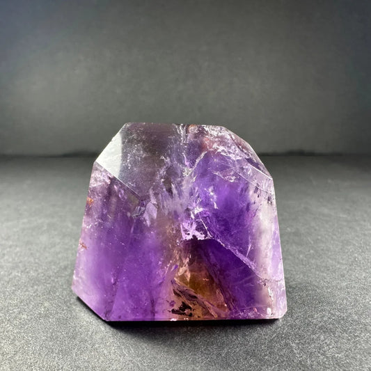 Stunning Bolivian ametrine crystal with purple hues and gold shimmer