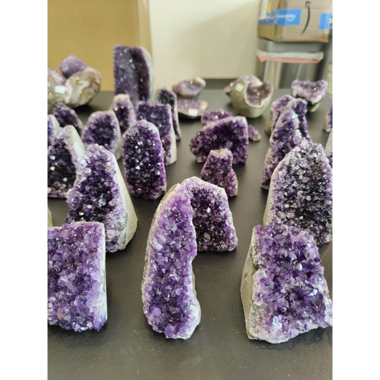 Stunning Brazilian amethyst cut base geode with purple crystals and quartz