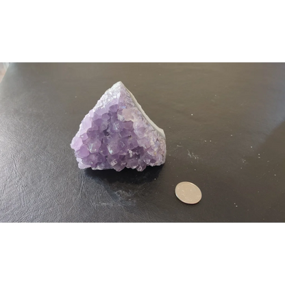 Stunning Brazilian amethyst druze crystal geode with purple hues