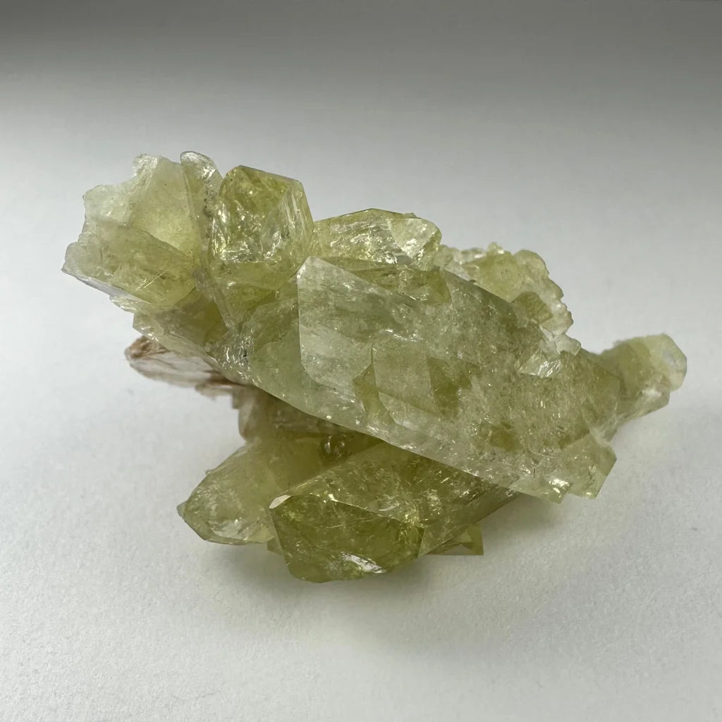 Stunning Brazilian Brazilianite crystal cluster with Muscovite and translucent yellow-green jagged facets