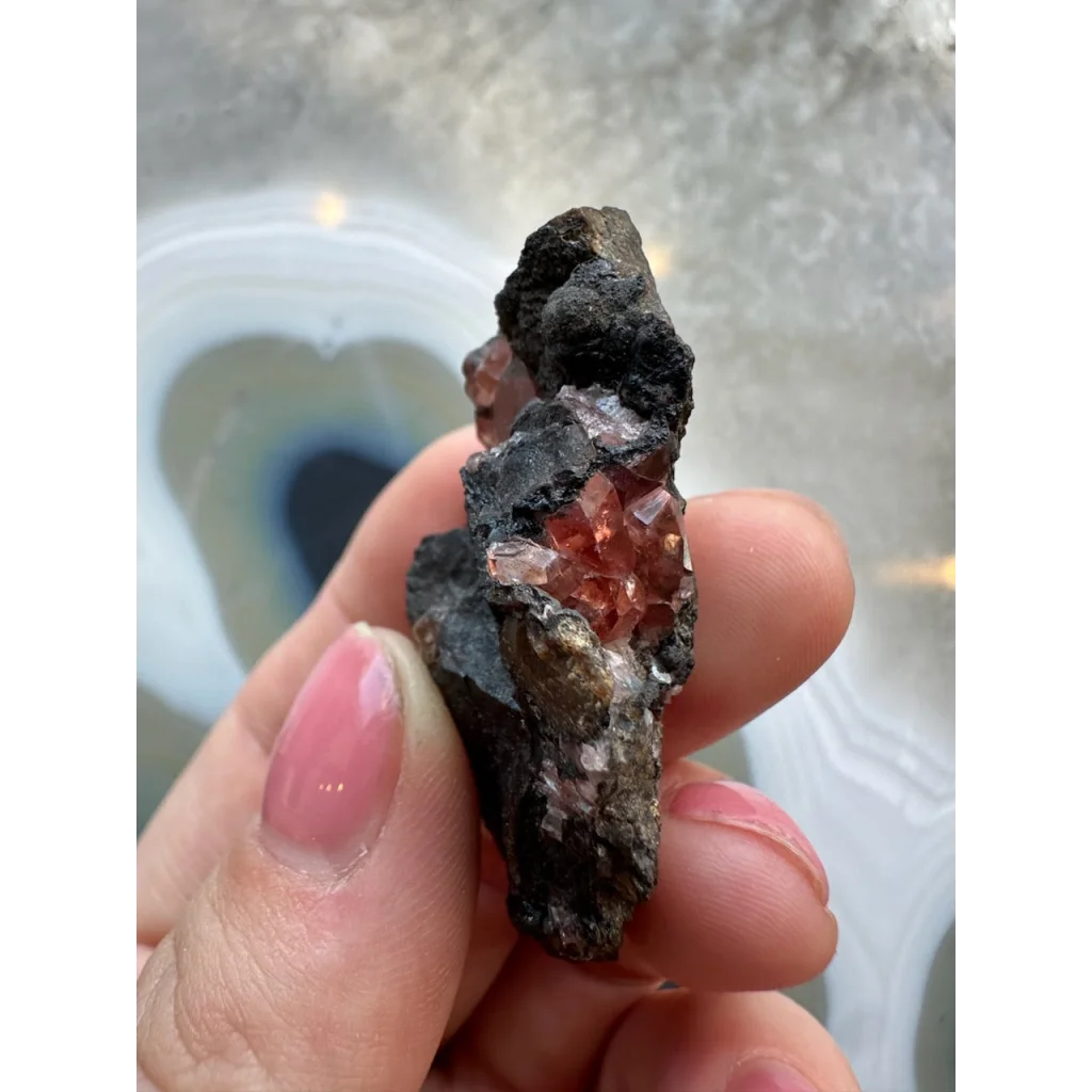 Stunning Brazilian Rhodochrosite crystal cluster on dark matrix