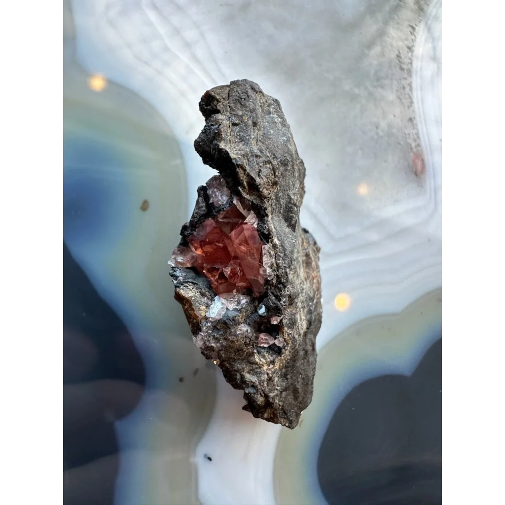 Stunning Brazilian Rhodochrosite crystal cluster on dark matrix