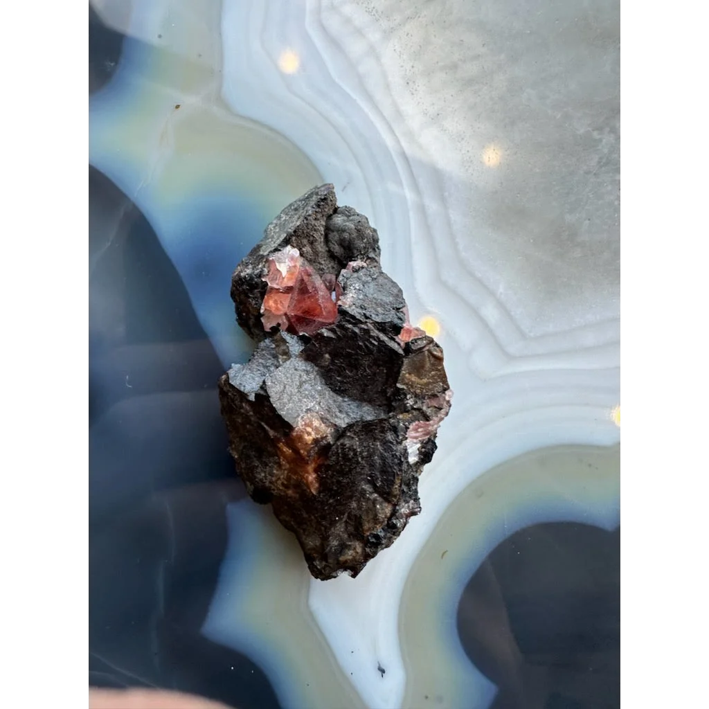 Stunning Brazilian Rhodochrosite crystal cluster on dark matrix