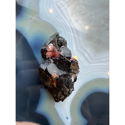 Stunning Brazilian Rhodochrosite crystal cluster on dark matrix