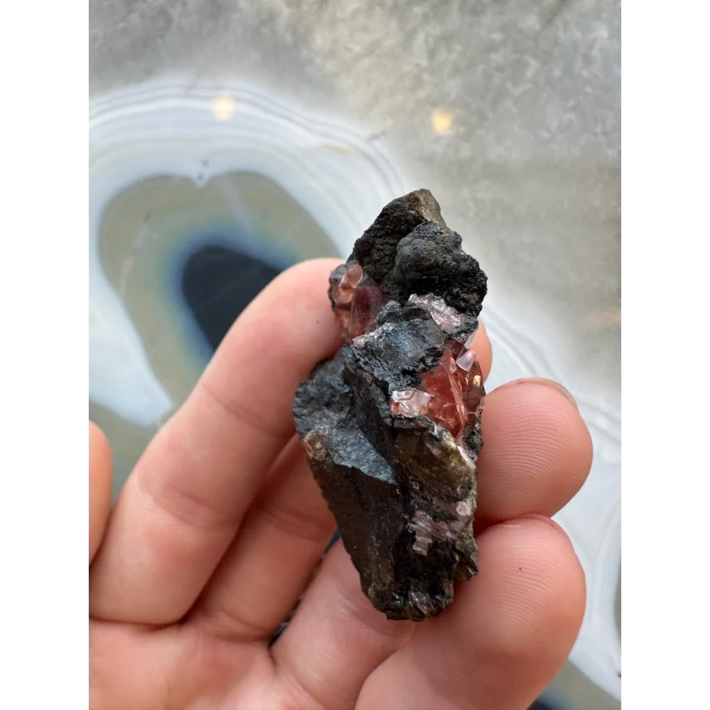 Stunning Brazilian Rhodochrosite crystal cluster on dark matrix