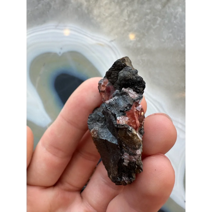 Stunning Brazilian Rhodochrosite crystal cluster on dark matrix