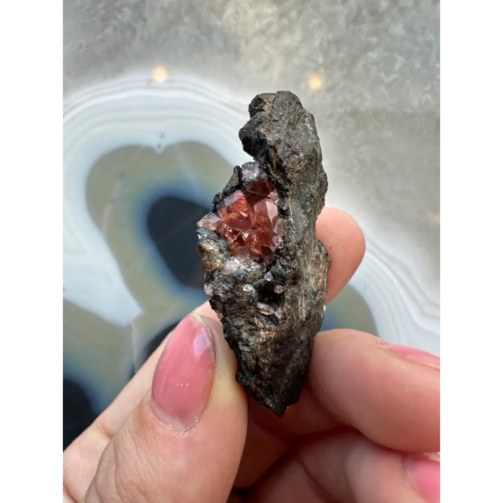 Stunning Brazilian Rhodochrosite crystal cluster on dark matrix