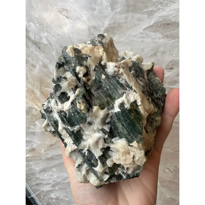 Stunning Brazilian tourmaline crystals on albite matrix in hand