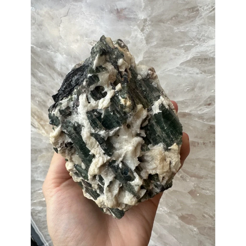 Stunning Brazilian Tourmaline on Albite crystal powerhouse held in hand