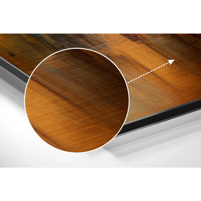 Stunning brushed aluminium dibond art on dark brown wooden table