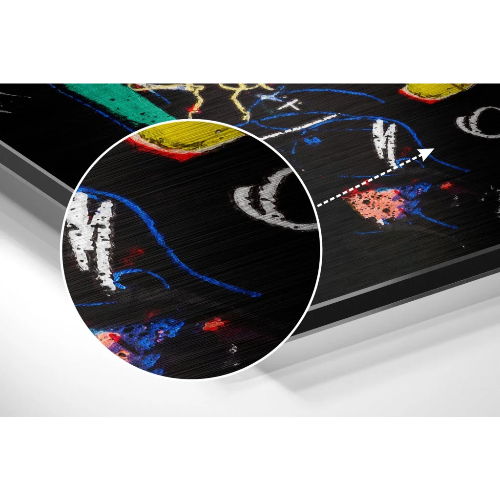 Black and white skateboard with colorful graphics on brushed aluminium dibond