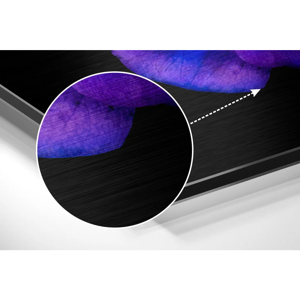 Black and purple textured laptop skin on brushed aluminium dibond