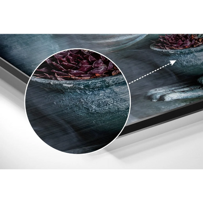 Dark teal canvas art of burgundy leaves in stone bowl, brushed aluminium dibond