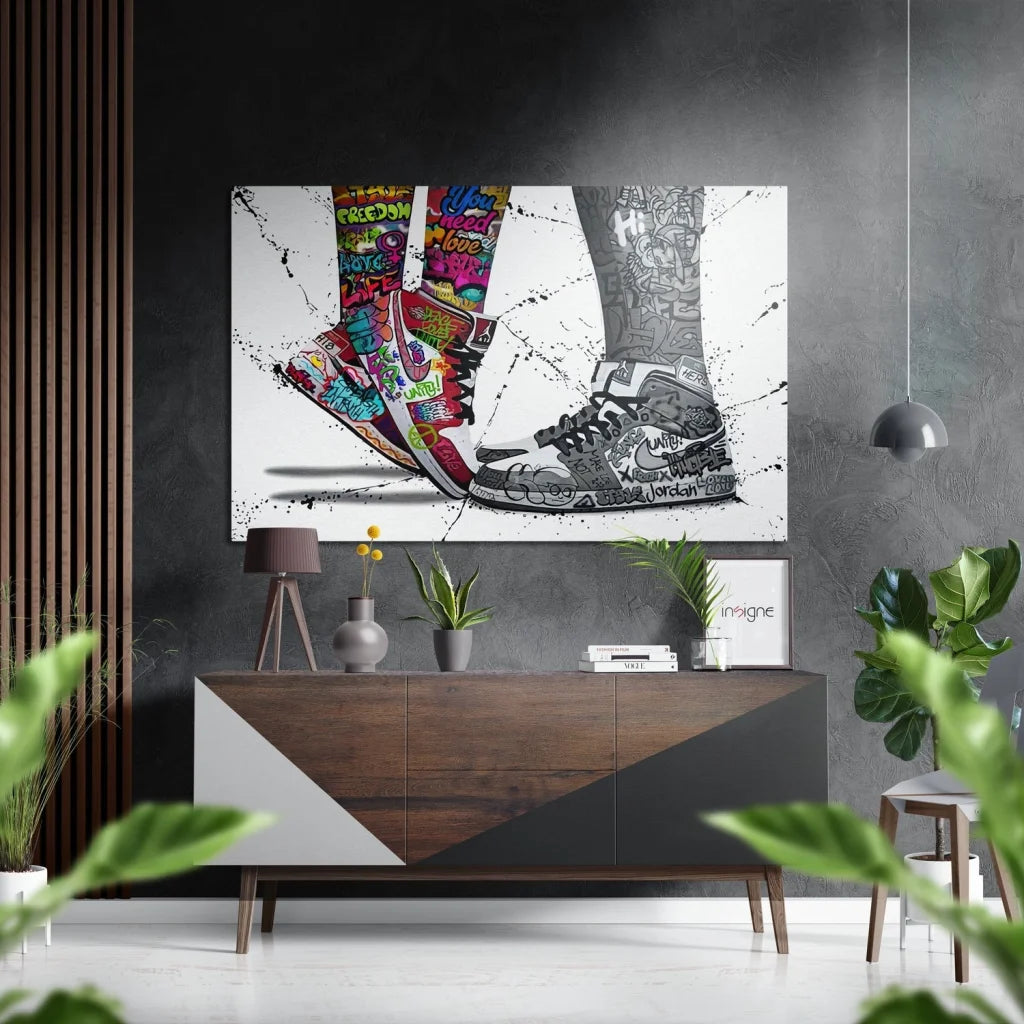 Black and white sneakers with colorful soles on brushed aluminium dibond wall art
