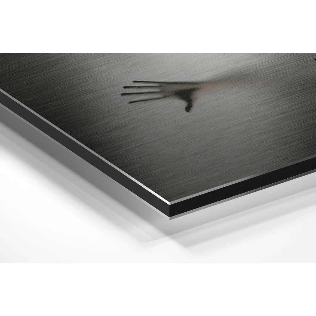 Black brushed aluminium dibond wall art with subtle handprint