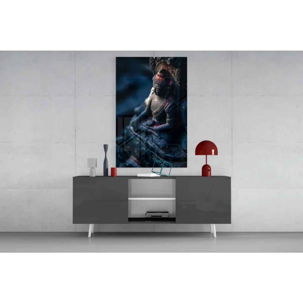 Modern gray sideboard with white accents and sleek legs near stunning Buddha glass wall art