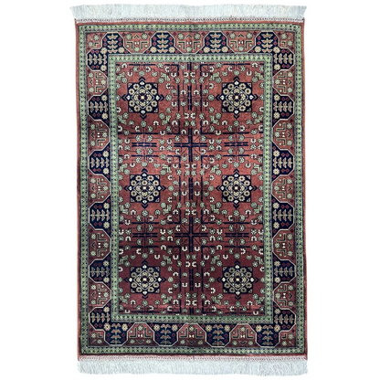 Stunning burgundy Bukharayi rug with intricate Afghani patterns