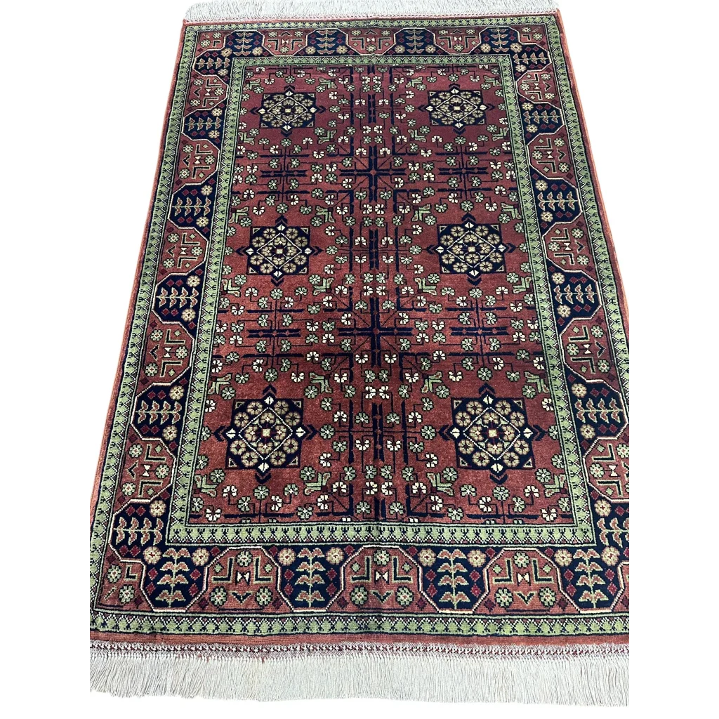 Stunning burgundy Bukharayi rug with intricate Afghani patterns