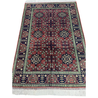 Stunning burgundy Bukharayi rug with intricate Afghani patterns
