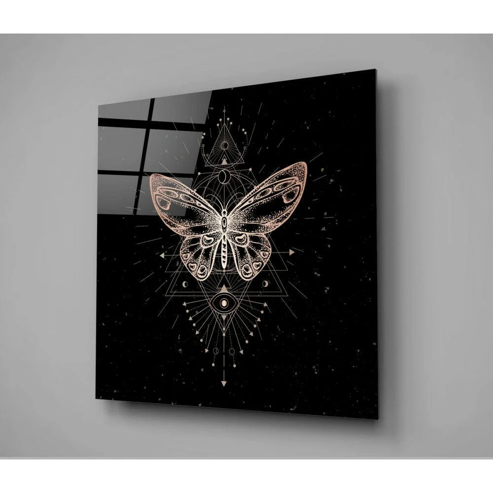 Stunning gold butterfly glass wall art with geometric patterns and celestial symbols on black background