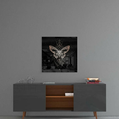 Stunning gold butterfly glass wall art with celestial symbols on black background