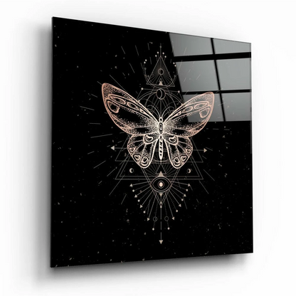 Stunning white butterfly glass wall art with celestial symbols on black background
